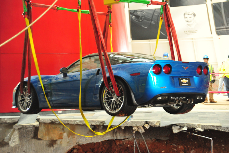 Illustration for article titled Check Out These Amazing Photos From The Corvette Sinkhole Recovery